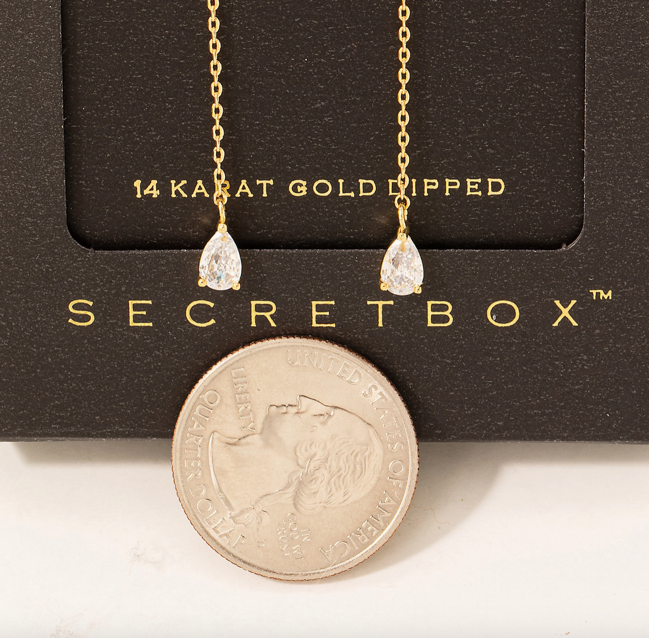 SECRET BOX TEAR DANGLE EARRINGS