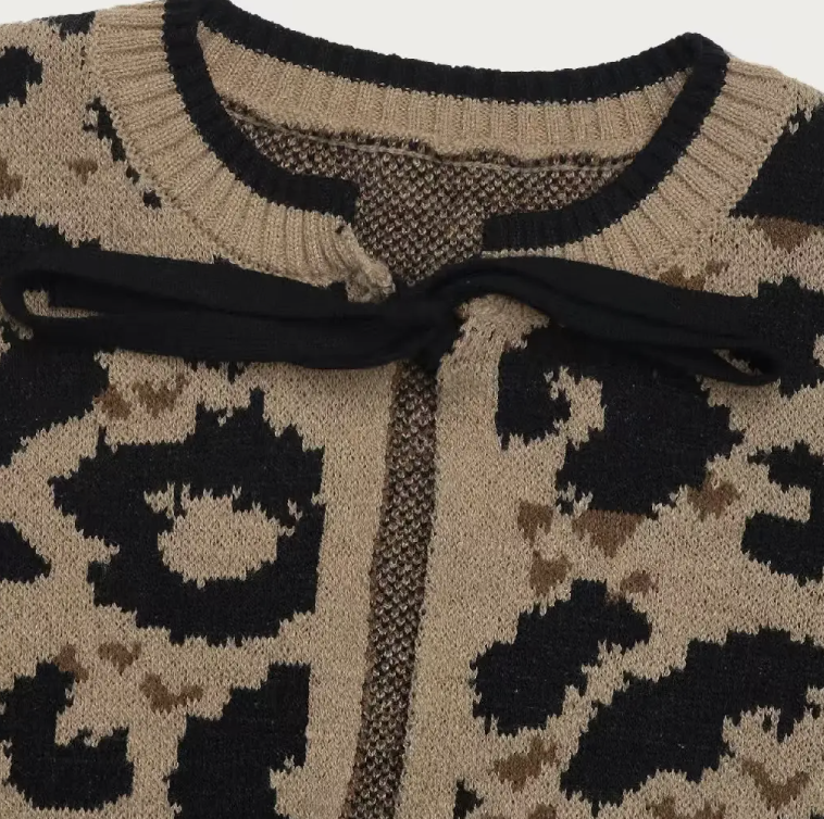 THE MOMENT KNOT YOUR AVERAGE LEOPARD SWEATER